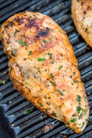 Grilled boneless and skinless chicken breasts