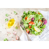 Spring mix salad with cucumber, cherry tomatoes, carrot and red onion
